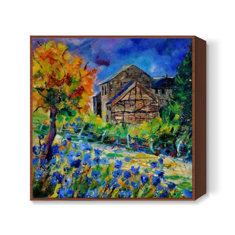 Blue flowers and old houses Square Art Prints