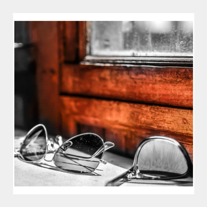 glass by the orange wall Square Art Prints