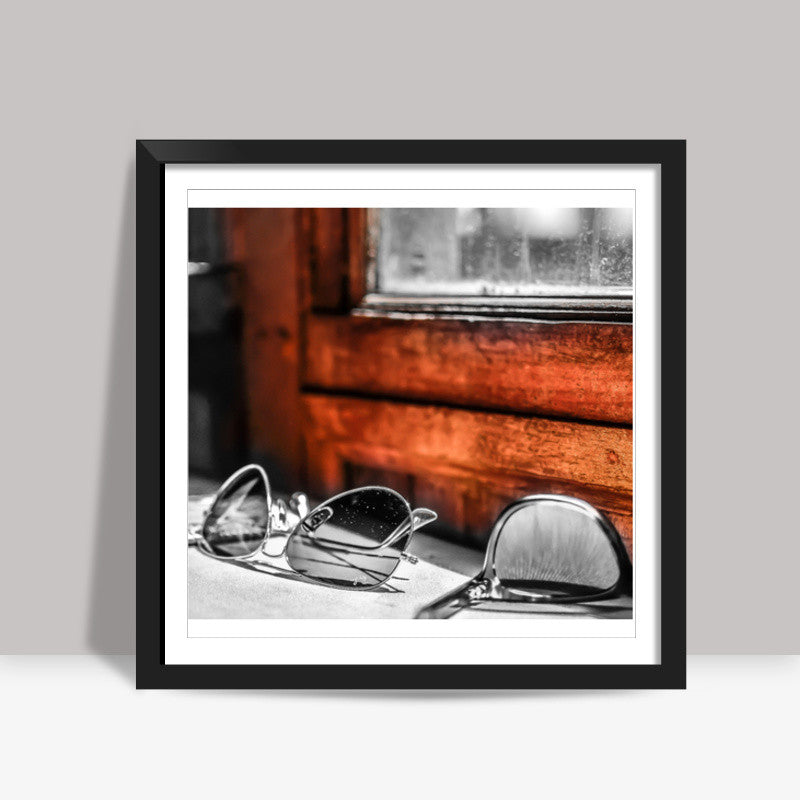 glass by the orange wall Square Art Prints