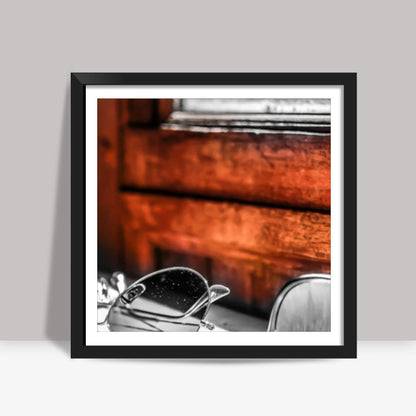 glass by the orange wall Square Art Prints