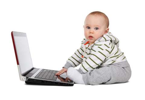 Baby With A Laptop  Wall Art