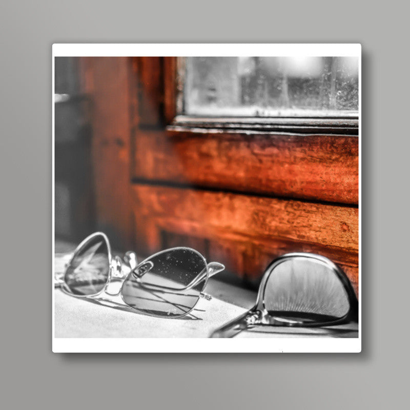 glass by the orange wall Square Art Prints